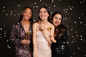 Girls at a bar mitzvah party in a photo booth